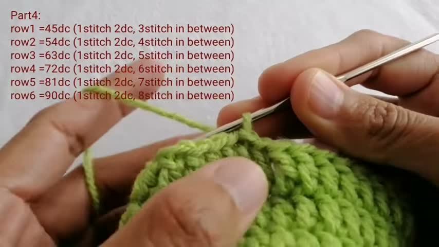 Working the continuous 9-stitch increase rows to shape the tapering cone into the 90-stitch crown.